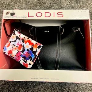 Brand new in box Lodis black leather tote and wristlet.